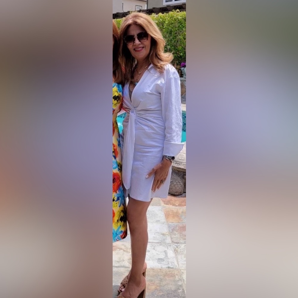 A beautiful white dress. You can dress it up or dress it down.